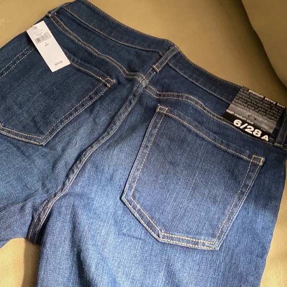 NWT GAP women’s, medium wash, skinny boot jeans, never worn. - Picture 5 of 5